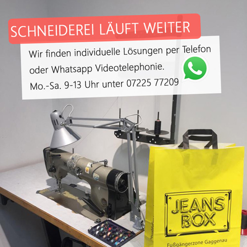 zeigt Nähmaschine mit Jeans Box Tüte zeigt Nähmaschine mit Jeans Box Tüte