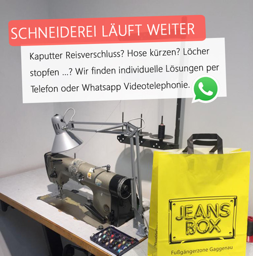 zeigt Nähmaschine mit Jeans Box Tüte zeigt Nähmaschine mit Jeans Box Tüte